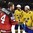 COLOGNE, GERMANY - MAY 21: Canada's Sean Couturier #14 and Sweden's Elias Lindholm #28 shake hands following a team Sweden 2-1 shootout win during gold medal game action at the 2017 IIHF Ice Hockey World Championship. (Photo by Matt Zambonin/HHOF-IIHF Images)
